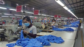 40% doanh nghiệp ở Long An đã quay trở lại sản xuất. Họ được phép sử dụng tối đa lượng lao động có nhu cầu - Ảnh: AN LONG