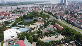Lợi dụng thông tin Dự án cầu Trần Hưng Đạo bắc qua sông Hồng được phê duyệt, các “cò đất” đã thổi giá nhiều khu đất tại phường Bồ Đề (quận Long Biên).