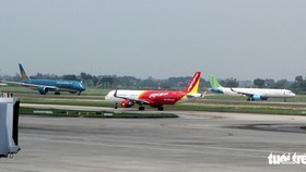 Vietnam Airlines, Bamboo Airways, Pacific Airlines đồng ý có giá sàn vé máy bay trên 0 đồng, còn Vietjet và Vietravel Airlines cho rằng giá sàn gây nhiều tác động tiêu cực - Ảnh: TUẤN PHÙNG