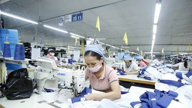 Diễn đàn Kinh tế Việt Nam 2021 sẽ đưa ra các gợi ý chính sách để phục hồi kinh tế-xã hội. (Ảnh: TTXVN)