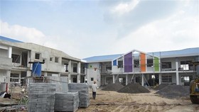 Trường mần non số 3 - Khu tái định cư Lộc An-Bình Sơn đã cơ bản hoàn thành. (Ảnh: Công Phong/TTXVN)