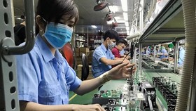 CPI bình quân 6 tháng đầu năm tăng 2,44% so với cùng kỳ năm trước, kéo theo lạm phát cơ bản tăng 1,25%. (Ảnh: TTXVN)