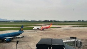 Máy bay của các hãng hàng không tại một sân bay. (Ảnh: Việt Hùng/Vietam+)
