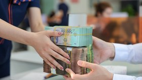 Tìm các giải pháp tháo gỡ ‘điểm nghẽn’ dòng tiền
