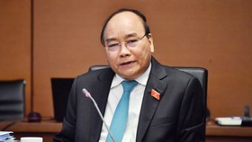 Thủ tướng Nguyễn Xuân Phúc phát biểu thảo luận tại tổ sáng 24/10. Ảnh: HNMO