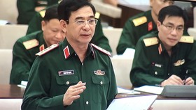 Thượng tướng Phan Văn Giang, Thứ trưởng Bộ Quốc phòng thừa ủy quyền của Chính phủ trình bày về dự án Luật Lực lượng dự bị động viên