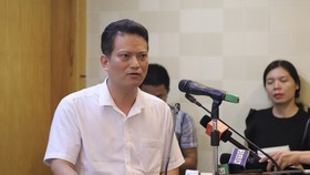 Ông Nguyễn Xuân Hải, Vụ trưởng Vụ Thẩm định Đánh giá tác động môi trường (Bộ Tài nguyên và Môi trường) trả lời phóng viên tại cuộc họp báo