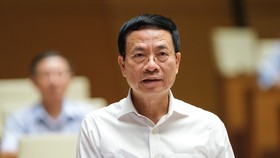 Bộ trưởng Bộ TT-TT Nguyễn Mạnh Hùng. Ảnh: VIẾT CHUNG