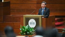 Bộ trưởng Bộ Công an Tô Lâm trình bày Báo cáo công tác phòng, chống tội phạm và vi phạm pháp luật năm 2022. Ảnh: QUANG PHÚC
