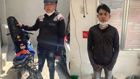 Trí và Phú (từ trái qua phải) tại cơ quan công an