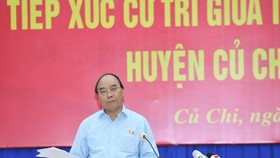 President Nguyen Xuan Phuc: Not to let development make people impoverished
