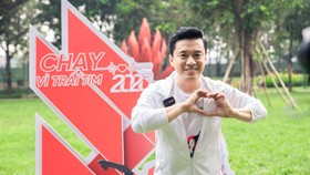 Ca sĩ Lam Trường chạy gây quỹ cho các em nhỏ mắc bệnh tim bẩm sinh. Ảnh: Dũng Phương