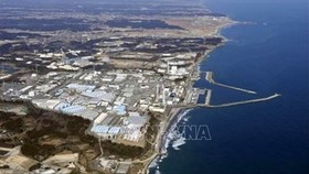 Các bể nước thải có chứa phóng xạ đã qua xử lý tại nhà máy điện hạt nhân Fukushima Daiichi ở tỉnh Fukushima, Nhật Bản. Ảnh: Kyodo/TTXVN