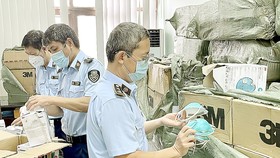 Lực lượng QLTT phát hiện, thu giữ hơn 20.000 khẩu trang y tế giả mạo nhãn hiệu 3M