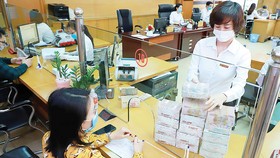 Trông chờ áp dụng Thông tư 14