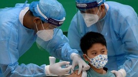 Mũi tiêm và câu chuyện trách nhiệm