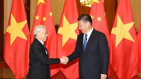 Tổng Bí thư, Chủ tịch nước Trung Quốc Tập Cận Bình đón Tổng Bí thư Nguyễn Phú Trọng trong chuyến thăm Trung Quốc hồi tháng 1-2017. Ảnh: TTXVN
