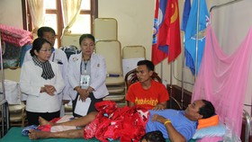  Đoàn lãnh đạo cấp cao TPHCM thăm các địa phương của Lào bị ảnh hưởng trong sự cố vỡ đập thủy điện
