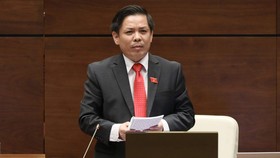 Bộ trưởng Nguyễn Văn Thể trả lời chất vấn. Ảnh: CHINHPHU.VN