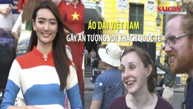 Áo dài Việt Nam gây ấn tượng với khách quốc tế