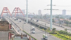 Tuyến đường Phạm Văn Đồng được đầu tư xây dựng bằng hình thức BT. Ảnh: CAO THĂNG 