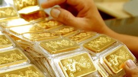 Gold devalues by nearly VND1 million per tael after God of Wealth Day