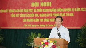Chairman of the HCMC People’s Committee Phan Van Mai speaks at the conference.