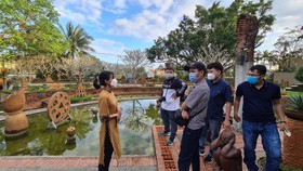 Tourists visit Thanh Ha pottery village in the city of Hoi An, Quang Nam province.