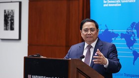 Prime Minister Pham Minh Chinh delivers a speech at Harvard Kennedy School. (Photo: VNA)