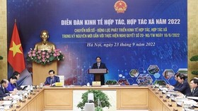 Prime Minister Pham Minh Chinh addresses the forum (Photo: VNA)