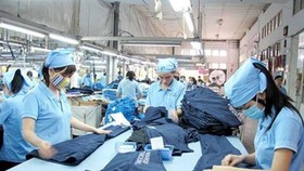 Many textile and garment enterprises in HCMC are seeing a sharp drop in export orders, mainly from the US and EU. (Photo: SGGP)
