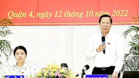  Chairman of the HCMC People’s Committee Phan Van Mai speaks at the meeting. ​