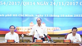 President Nguyen Xuan Phuc speaks at the meeting. (Photo: SGGP)