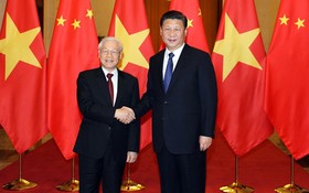 黨中央總書記、國家主席阮富仲（左）與中國共產黨總書記、國家主席習近平。（圖源：越通社）