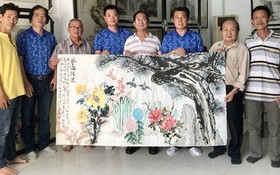 越中書畫家與合作的《藝海揚波》作品。