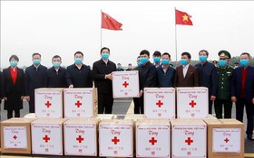 廣寧省向中國廣西省贈送防控疫情輔助物資。（圖源：互聯網）