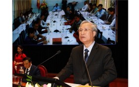 黨中央政治局委員、黨中央書記處常務書記陳國旺在科研會上致詞。