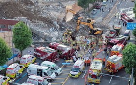 救援人員在光州建築倒塌現場工作。（圖源：新華社）