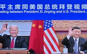 美國總統拜登(左)和中國國家主席習近平舉行視頻會晤。（圖源：新華社）