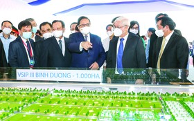 政府總理范明政參觀越新三工業區建築效果圖。