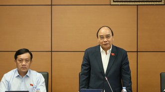 Chủ tịch nước Nguyễn Xuân Phúc phát biểu thảo luận tại tổ ĐBQH TPHCM về tình hình kinh tế - xã hội. Ảnh: QUANG PHÚC 