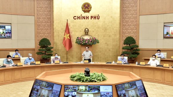 Thủ tướng Phạm Minh Chính, Trưởng Ban Chỉ đạo Quốc gia phòng, chống dịch Covid-19 chủ trì cuộc họp của Ban Chỉ đạo. ẢNH: VIẾT CHUNG