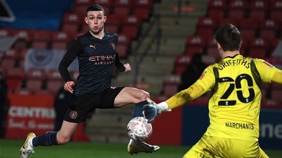 Phil Foden tiếp tục bén duyên ghi bàn để gúp Man.City vượt khó. Ảnh: Getty Images