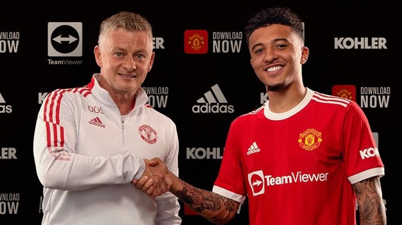 HLV Ole Gunnar Solskjaer và Jadon Sancho bắt tay hướng đến tương lai thành công.