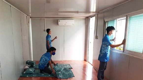 The Ocean Coatings (Vietnam) Company Limited, located in the Long Thành Industrial Zone, has set up six container offices to offer temporary accommodations for its workers. File photo from vnexpress.vn