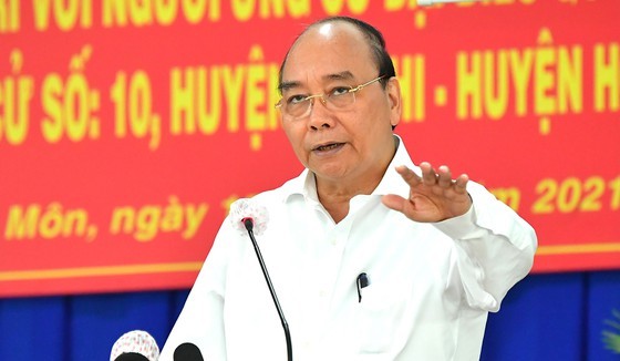 State President Nguyen Xuan Phuc speaks at the conference. (Photo: SGGP)