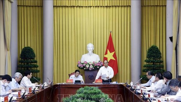 Chủ tịch nước làm việc với Thường trực Ban Chỉ đạo Đề án xây dựng Nhà nước pháp quyền. Ảnh: TTXVN