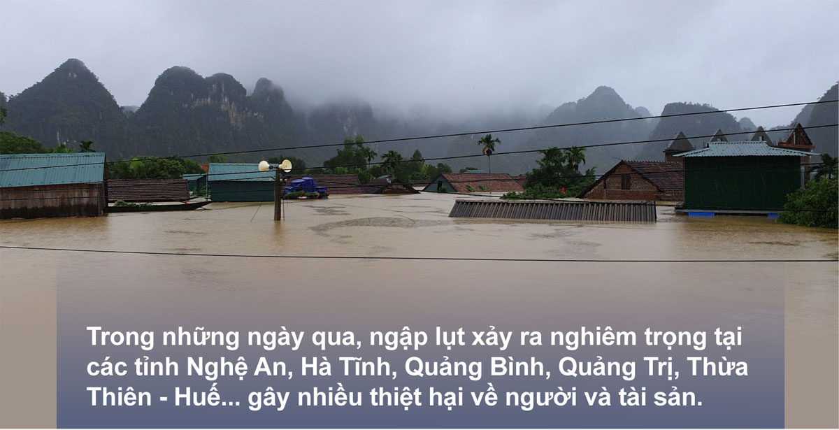 Miền Trung oằn mình trong bão lũ ảnh 1