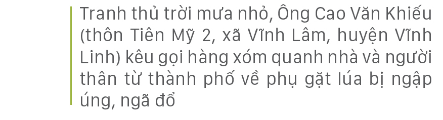 Nông dân miền Trung dầm mình cứu lúa sau mưa bão ảnh 11