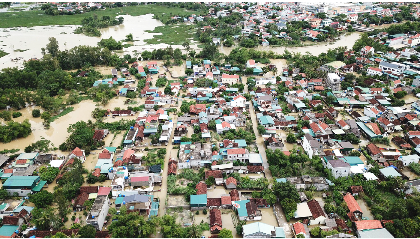 Tập trung hỗ trợ người dân miền Trung khắc phục hậu quả mưa lũ ảnh 26